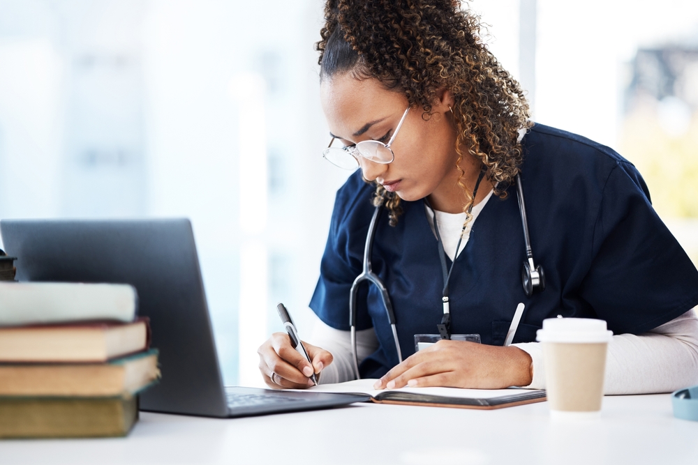 Nursing Student Studying at Laptop